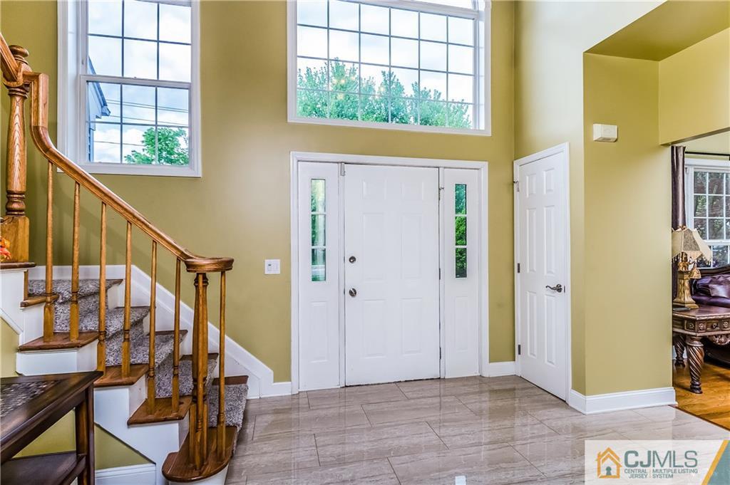 437 Vanderveer Road Raritan, NJ 08869 - Photo 12 of 25 a view of an entryway with wooden floor and windows