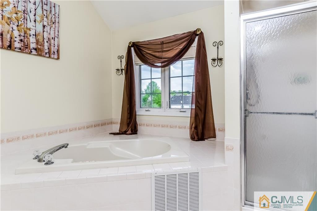 437 Vanderveer Road Raritan, NJ 08869 - Photo 15 of 25 a bathroom with a granite countertop sink and a mirror