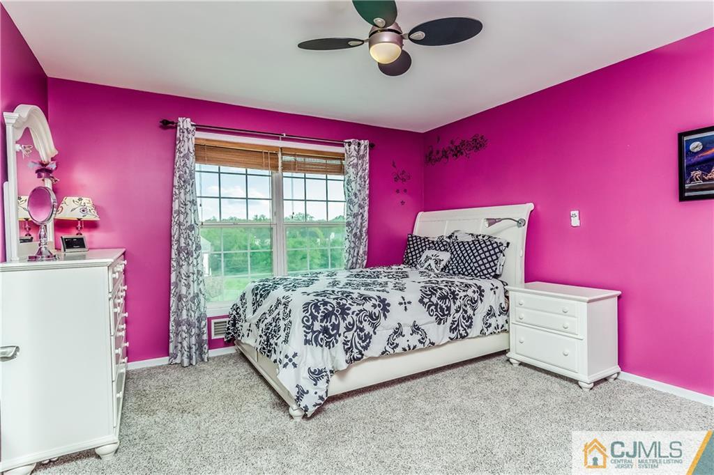 437 Vanderveer Road Raritan, NJ 08869 - Photo 16 of 25 a bed room with a bed and a window