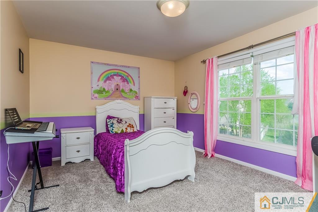 437 Vanderveer Road Raritan, NJ 08869 - Photo 17 of 25 a bedroom with a bed and a window