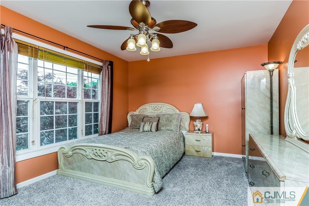 437 Vanderveer Road Raritan, NJ 08869 - Photo 18 of 25 a bedroom with a large bed and a large window