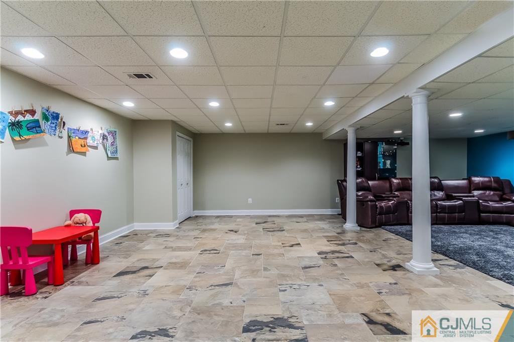 437 Vanderveer Road Raritan, NJ 08869 - Photo 21 of 25 a view of a room with gym equipment