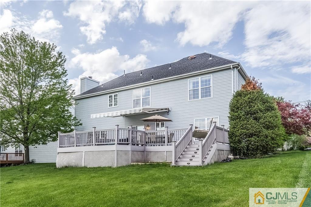 437 Vanderveer Road Raritan, NJ 08869 - Photo 25 of 25 a view of a house with a yard and sitting area