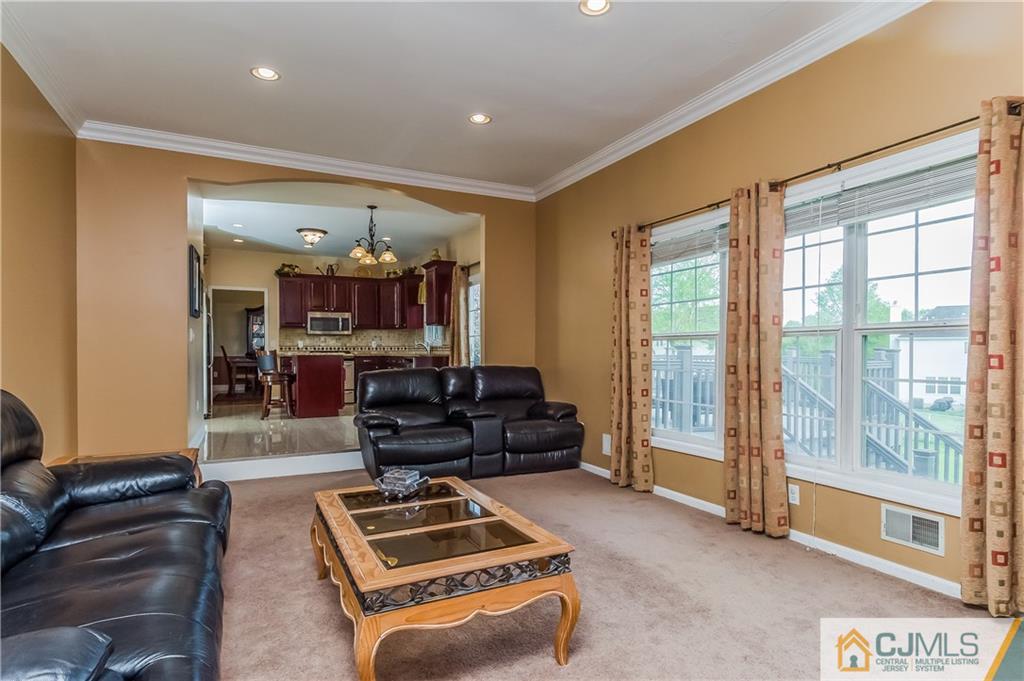 437 Vanderveer Road Raritan, NJ 08869 - Photo 6 of 25 a living room with furniture and a flat screen tv
