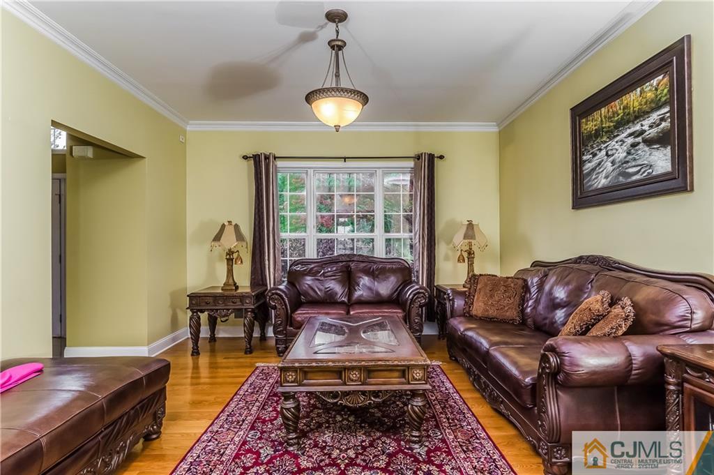 437 Vanderveer Road Raritan, NJ 08869 - Photo 9 of 25 a living room with furniture and a window
