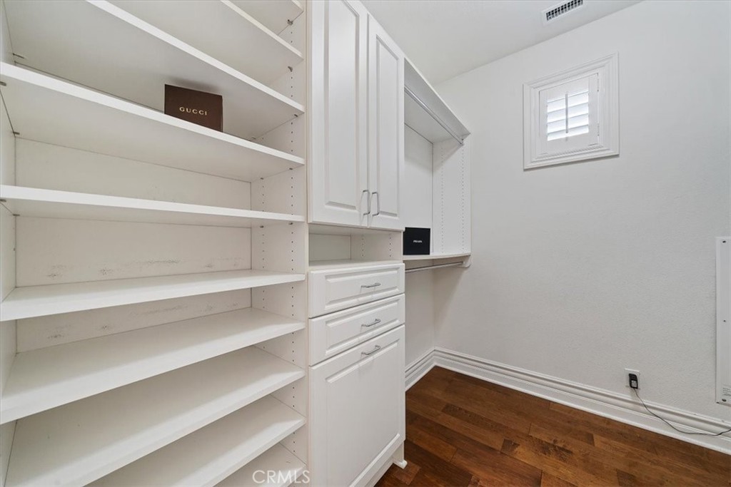 9 Waltham Road Ladera Ranch, CA 92694 - Photo 25 of 68 a view of walk in closet with empty racks