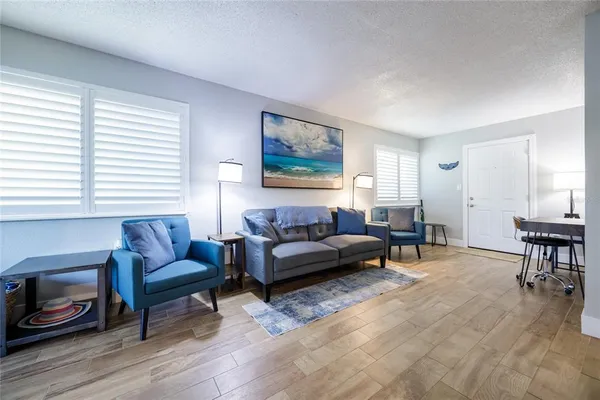 a bedroom with bed and a window