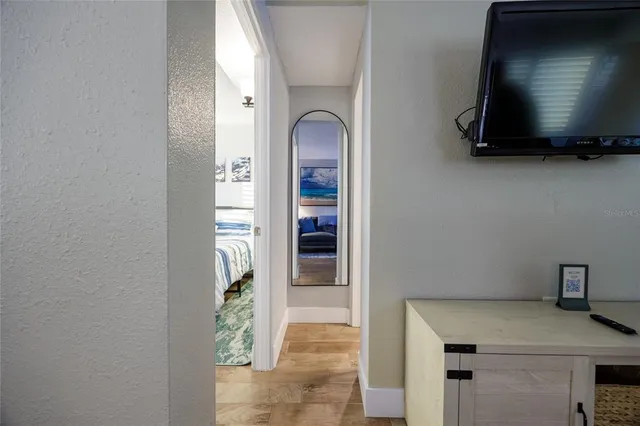 a bathroom with a double vanity sink mirror and toilet