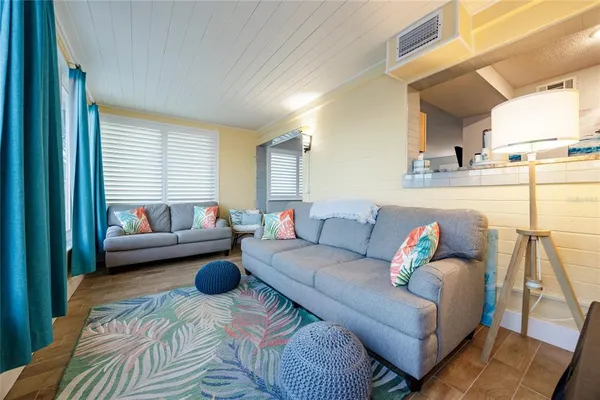 a view of dining room and cabinets