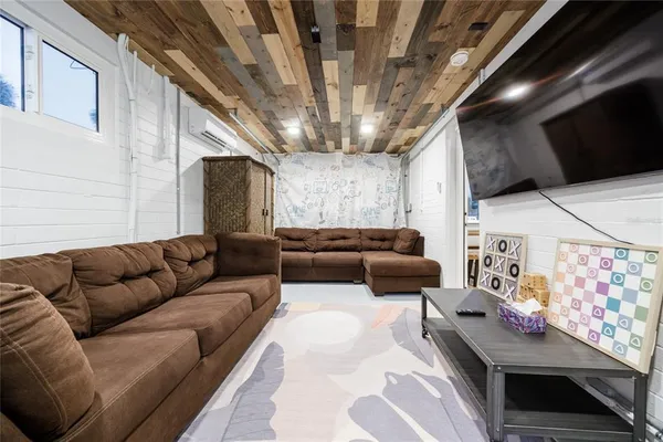 a view of a house with a yard and sitting area