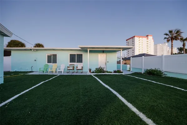 a view of a balcony with chairs