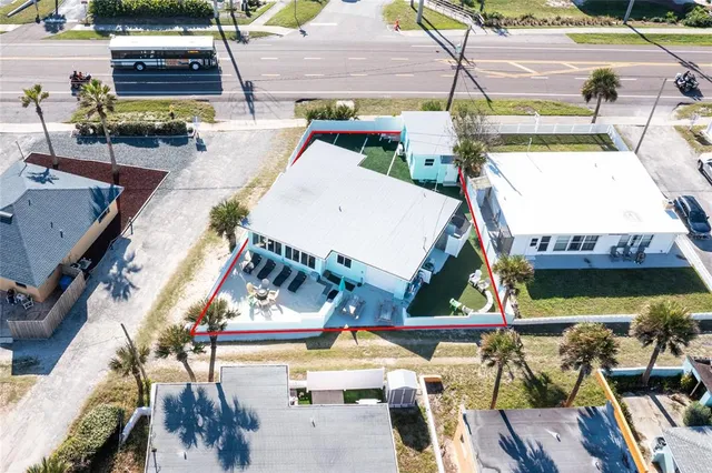 a view of a chairs and bench in the yard