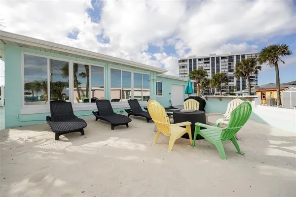a livingroom with furniture and a window