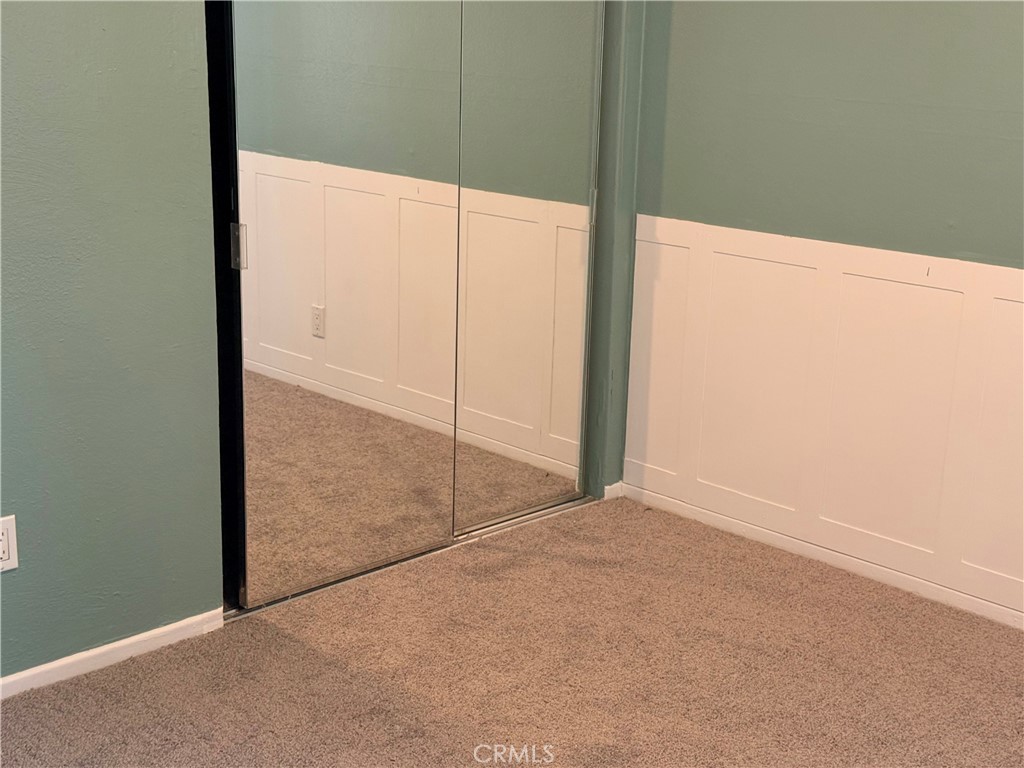 950 West Lambert Road, Unit 11 La Habra, CA 90631 - Photo 24 of 32 2nd bedroom with glass sliding closet doors