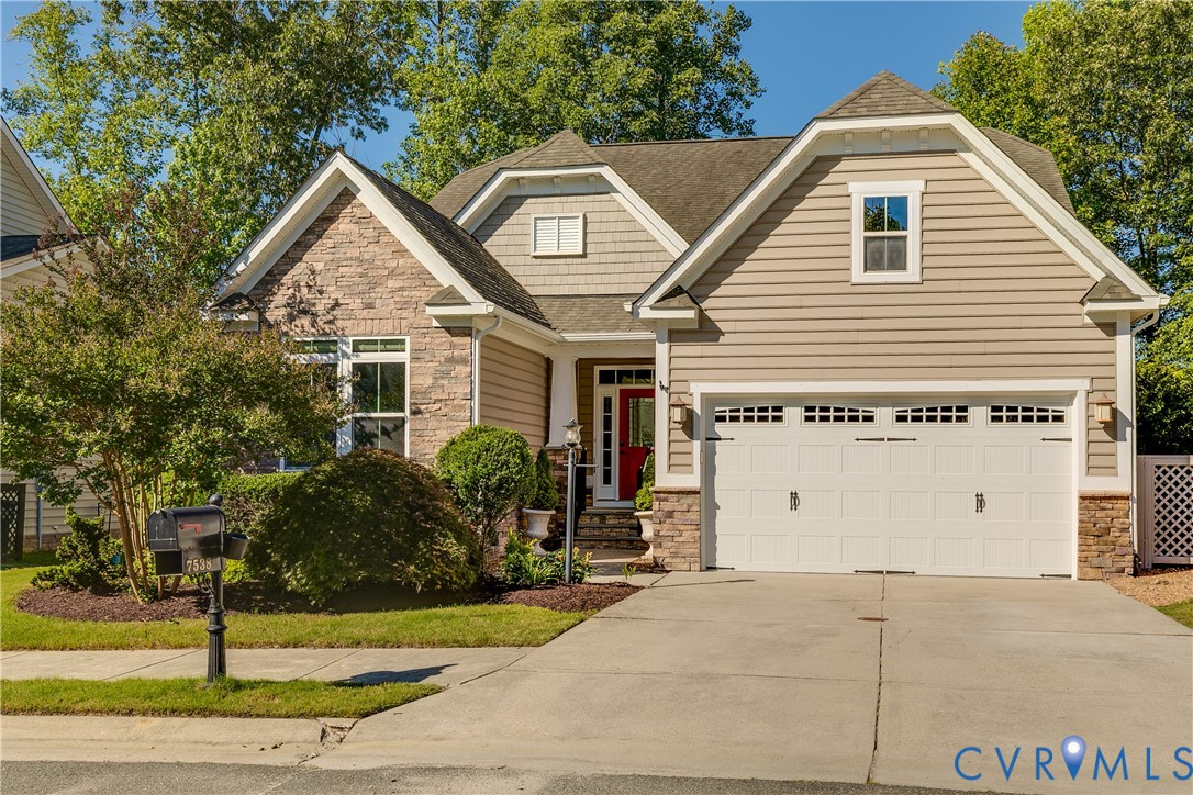 7538 South Franklins Way Quinton, VA 23141 - Photo 2 of 48 a view of a house with a yard and plants