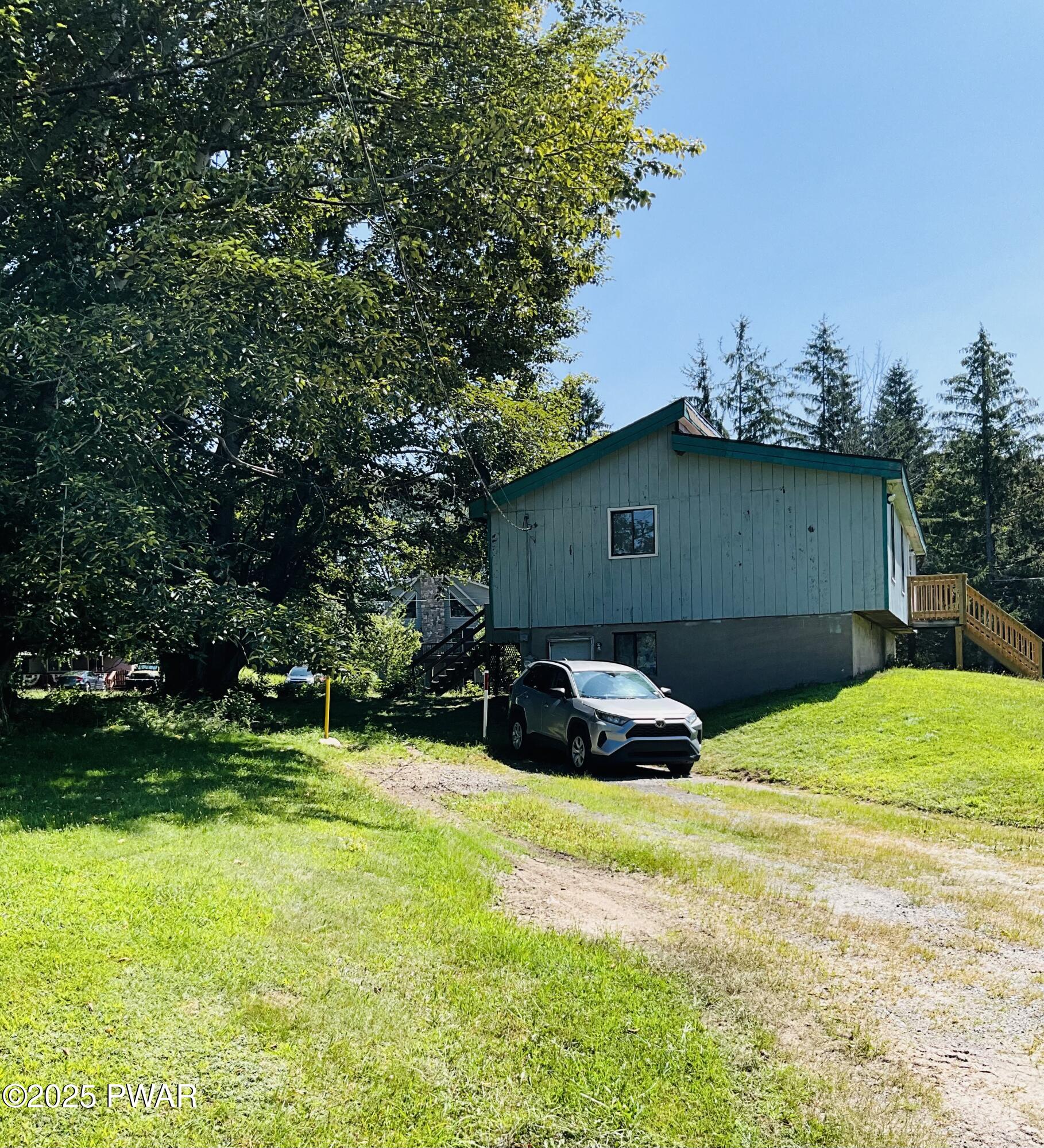 30 Brookfield Road, Unit LOT 1259 Lake Ariel, PA 18436 - Photo 17 of 32 a house view with a outdoor space