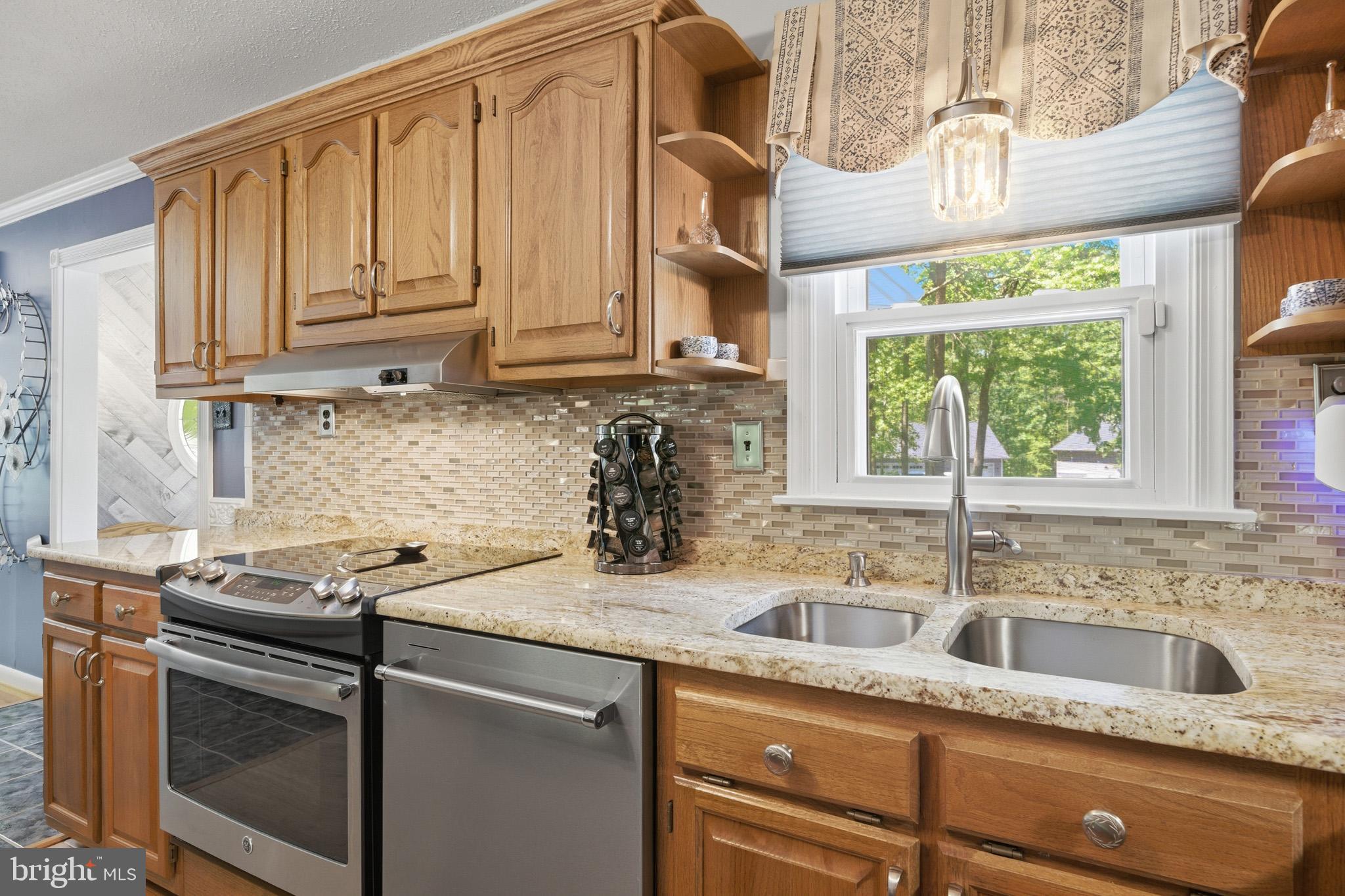 100 David Gray Road St. Leonard, MD 20685 - Photo 19 of 61 Lovely backsplash to complement the granite.