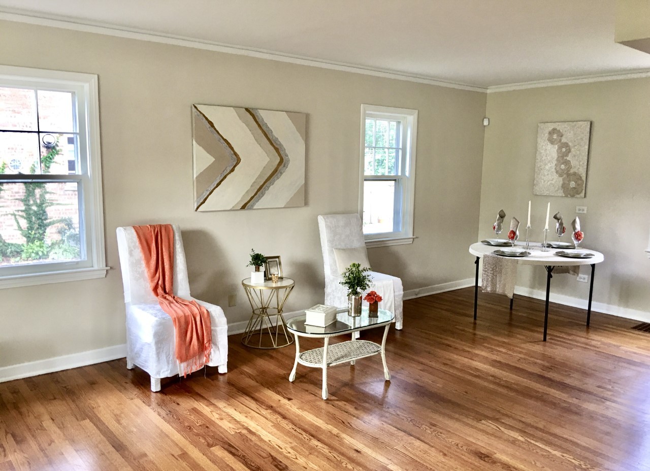 719 North County Line Road Hinsdale, IL 60521 - Photo 2 of 12 a living room with furniture and a wooden floor