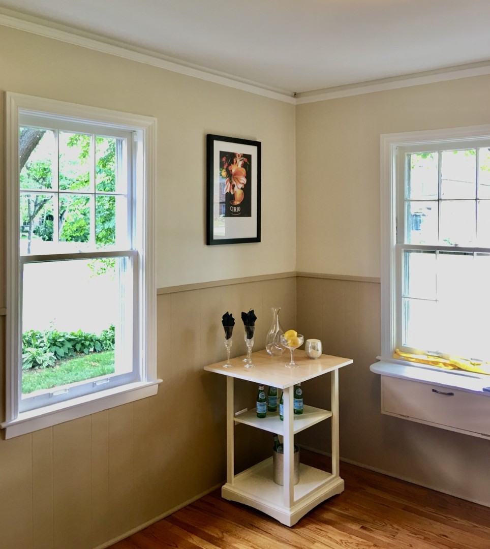 719 North County Line Road Hinsdale, IL 60521 - Photo 3 of 12 a room with furniture and a window