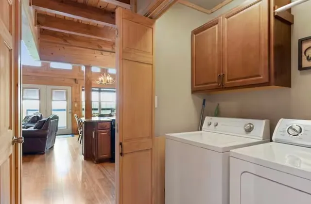 a utility room with dryer and washer