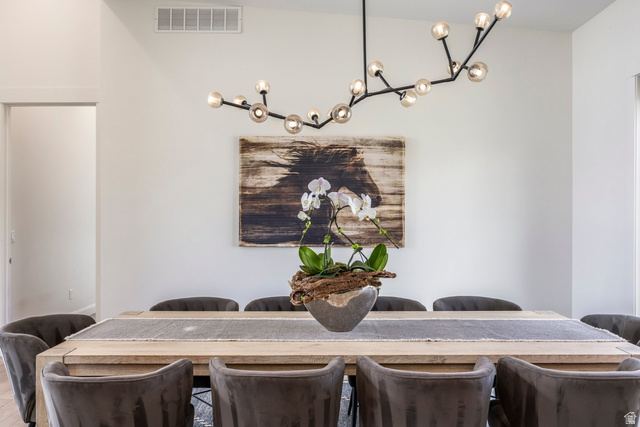 140 West Vista Road Kamas, UT 84036 - Photo 23 of 101 Natural wood-finish flooring, modern linear chandelier, and recessed lighting