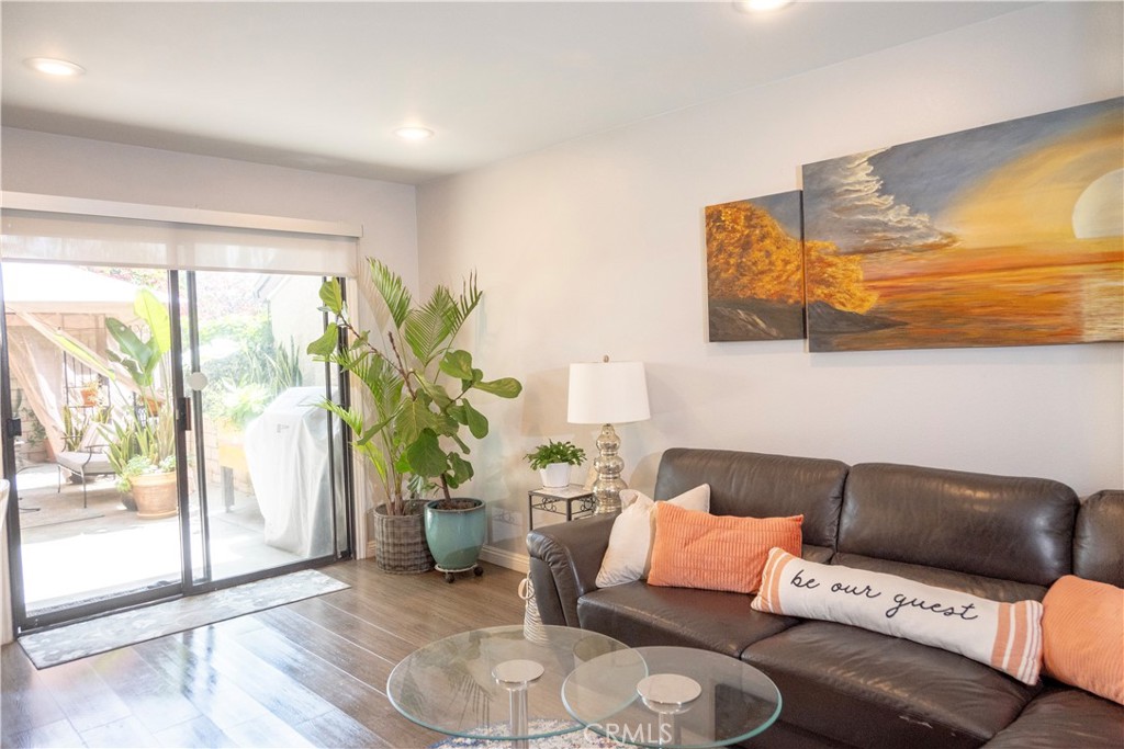 1320 Zeus West Covina, CA 91790 - Photo 13 of 39 a living room with furniture and a large window