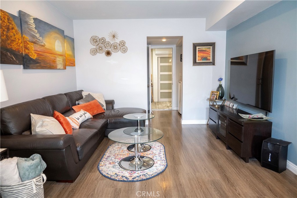 1320 Zeus West Covina, CA 91790 - Photo 14 of 39 a living room with furniture and a flat screen tv