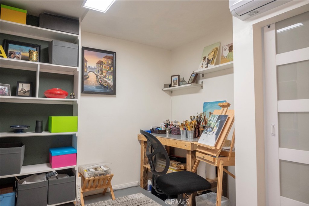 1320 Zeus West Covina, CA 91790 - Photo 17 of 39 a room with furniture and a book shelf