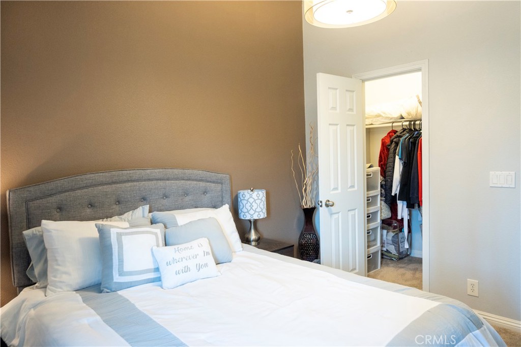 1320 Zeus West Covina, CA 91790 - Photo 23 of 39 a bedroom with a bed and a mirror