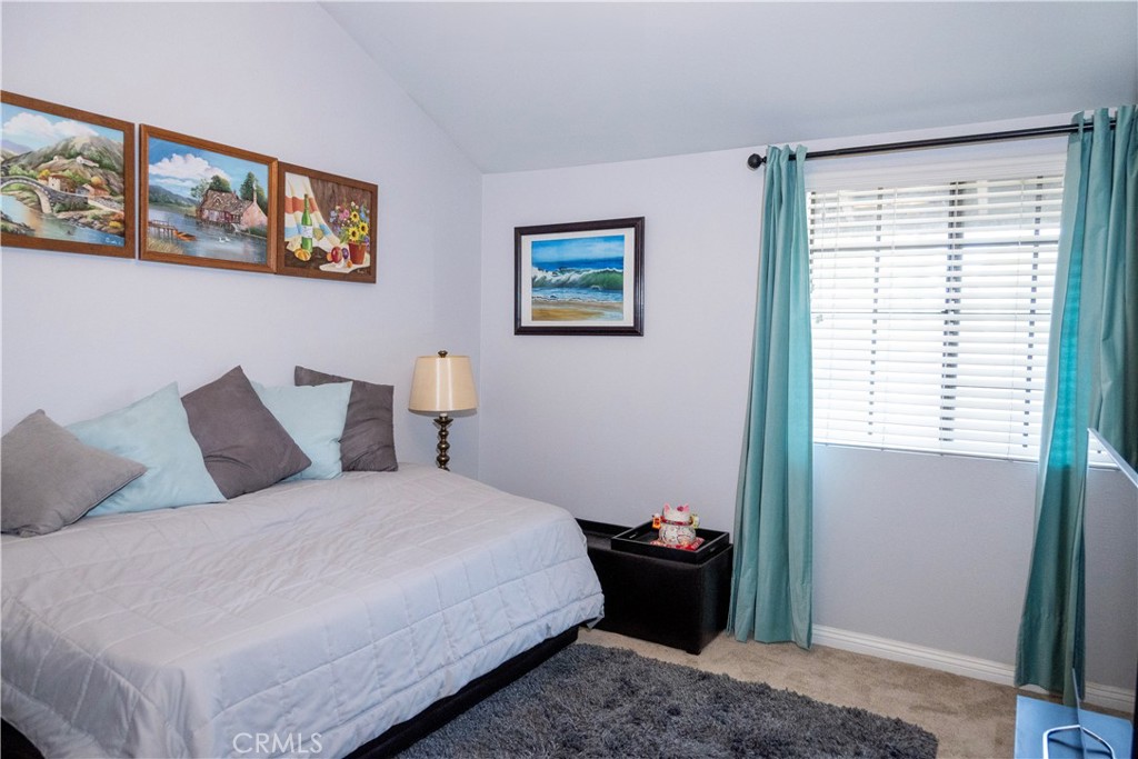 1320 Zeus West Covina, CA 91790 - Photo 26 of 39 a bedroom with a bed and painting on the wall