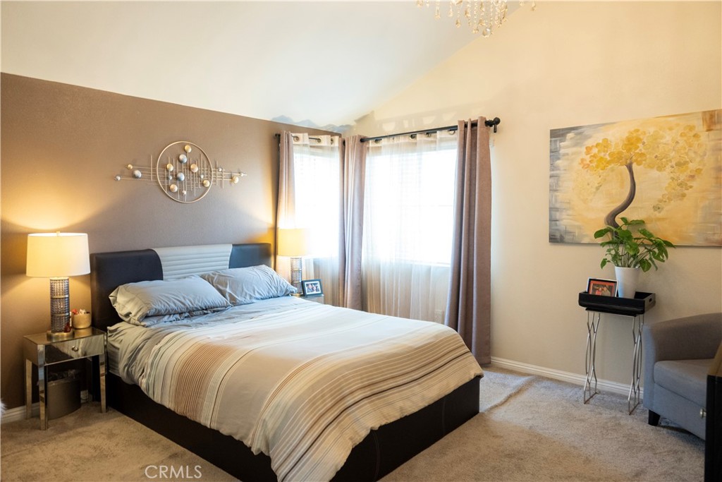 1320 Zeus West Covina, CA 91790 - Photo 27 of 39 a bedroom with a bed and a table