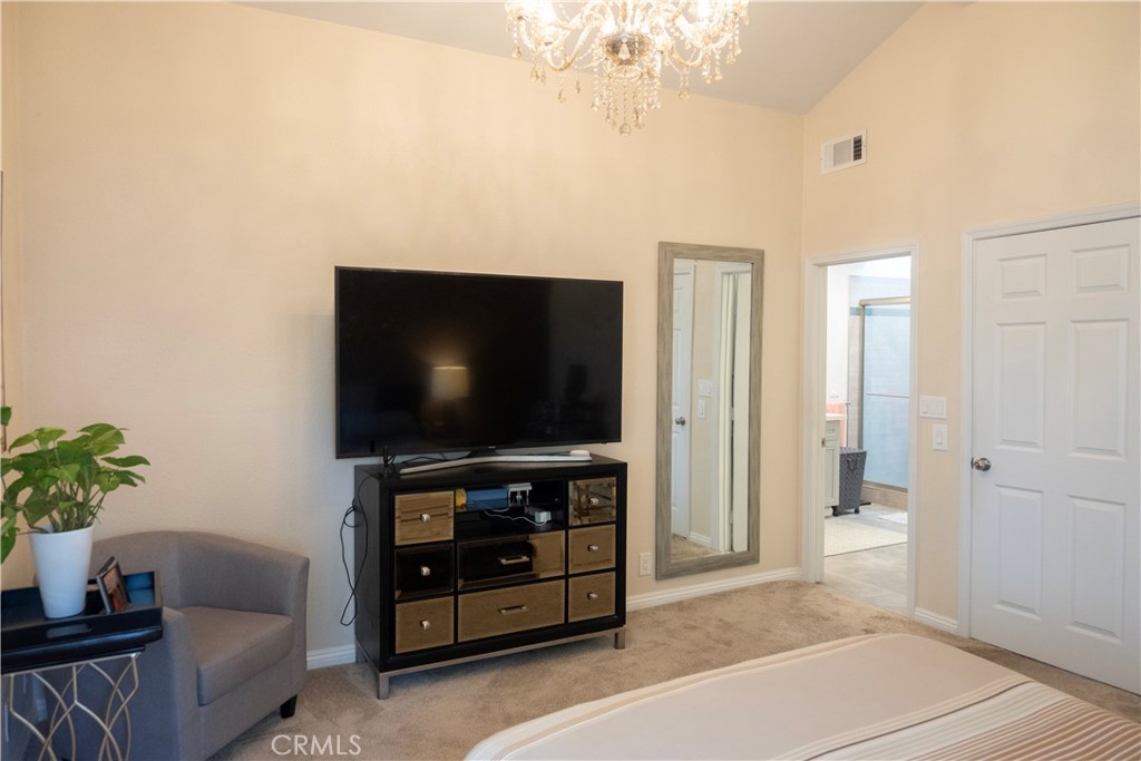 1320 Zeus West Covina, CA 91790 - Photo 28 of 39 a living room with furniture and a flat screen tv
