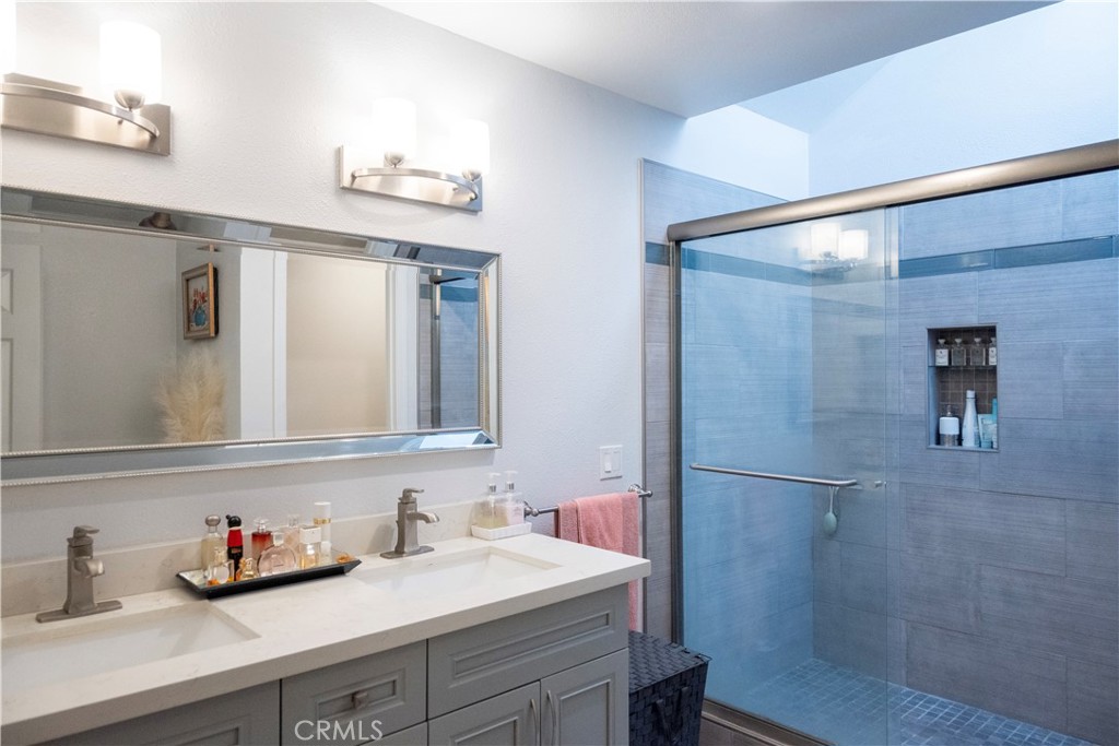 1320 Zeus West Covina, CA 91790 - Photo 29 of 39 a bathroom with a sink and a mirror
