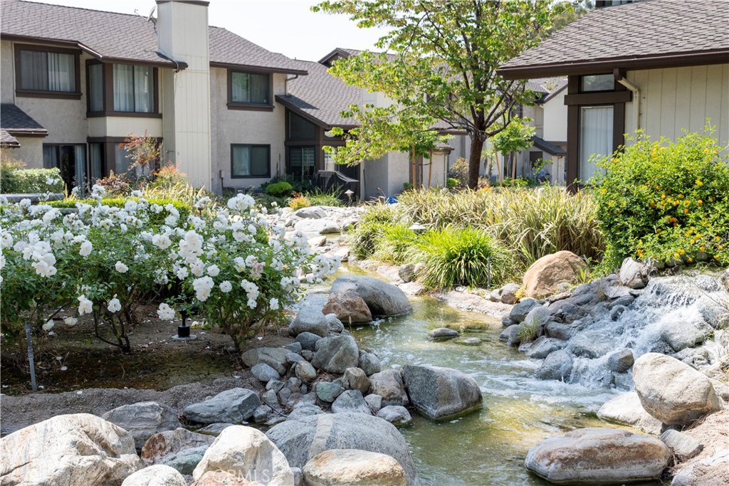1320 Zeus West Covina, CA 91790 - Photo 33 of 39 a front view of a house with a yard