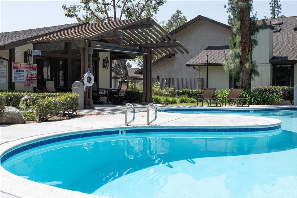 1320 Zeus West Covina, CA 91790 - Photo 36 of 39 a swimming pool with outdoor seating and yard