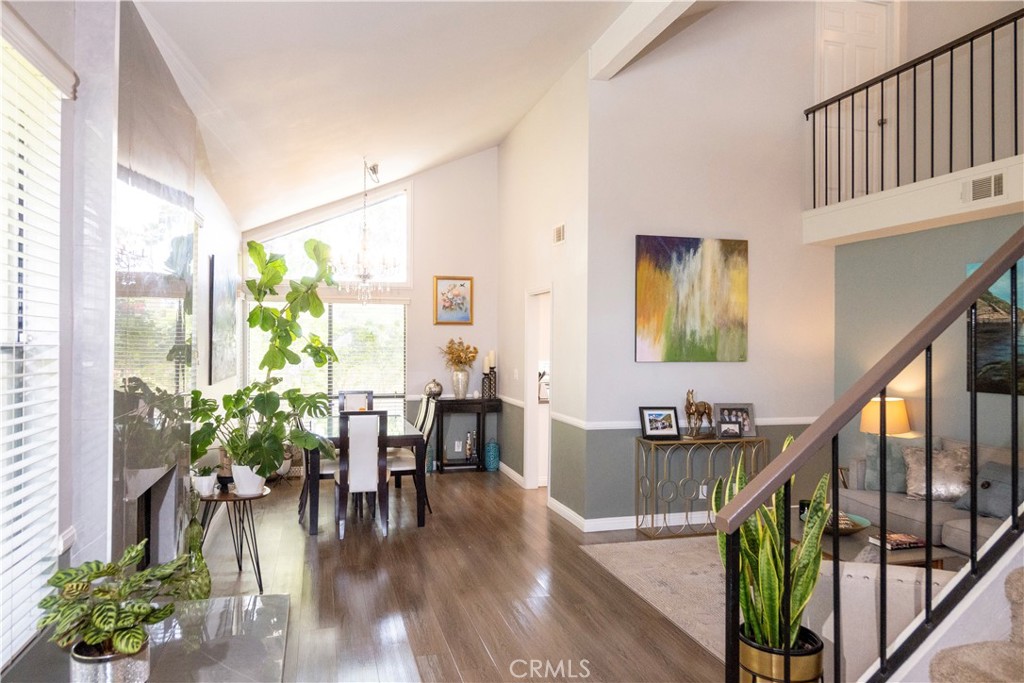 1320 Zeus West Covina, CA 91790 - Photo 4 of 39 a living room with furniture and a wooden floor