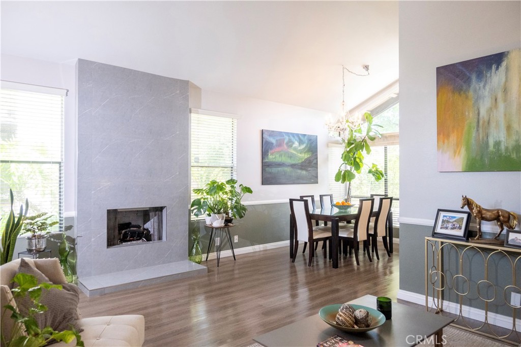 1320 Zeus West Covina, CA 91790 - Photo 5 of 39 a dining room with furniture potted plants and wooden floor