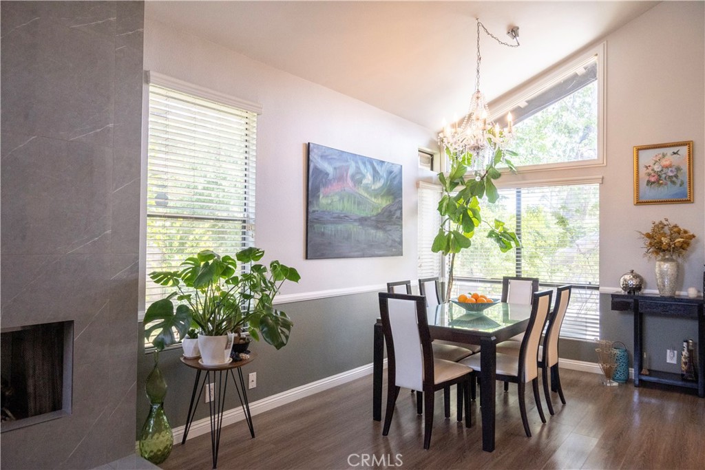 1320 Zeus West Covina, CA 91790 - Photo 6 of 39 a dining room with furniture potted plants and wooden floor