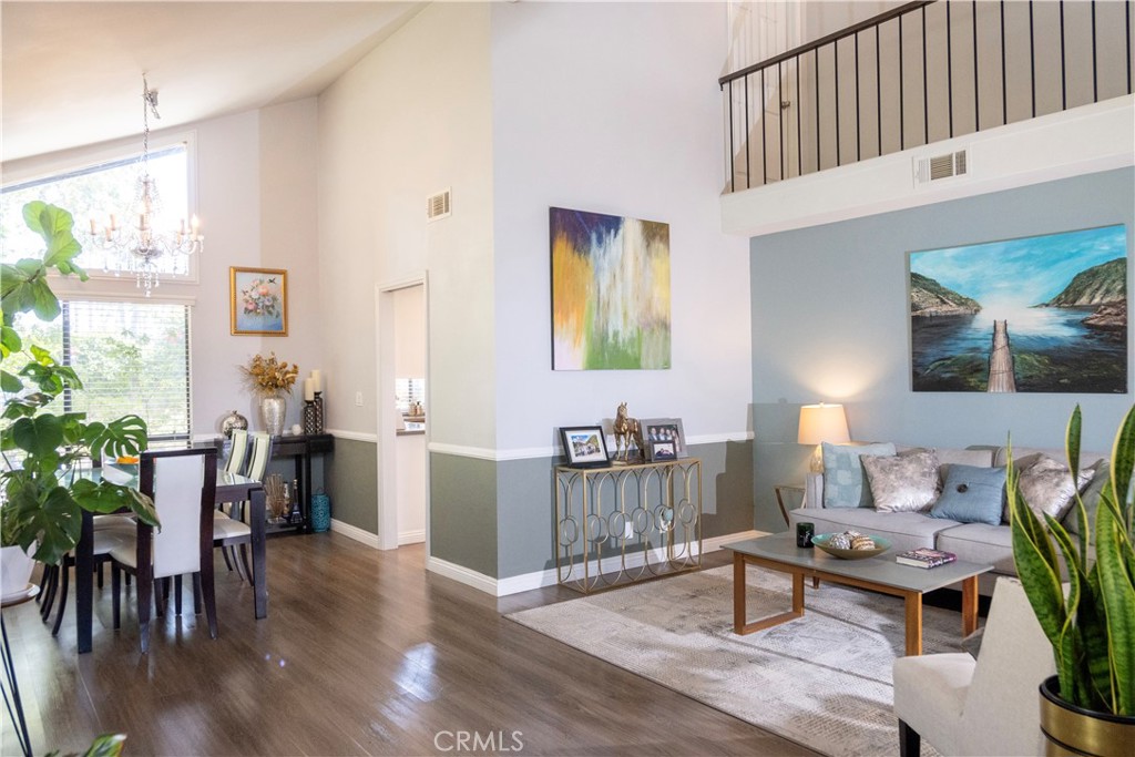 1320 Zeus West Covina, CA 91790 - Photo 7 of 39 a living room with furniture a window and wooden floor