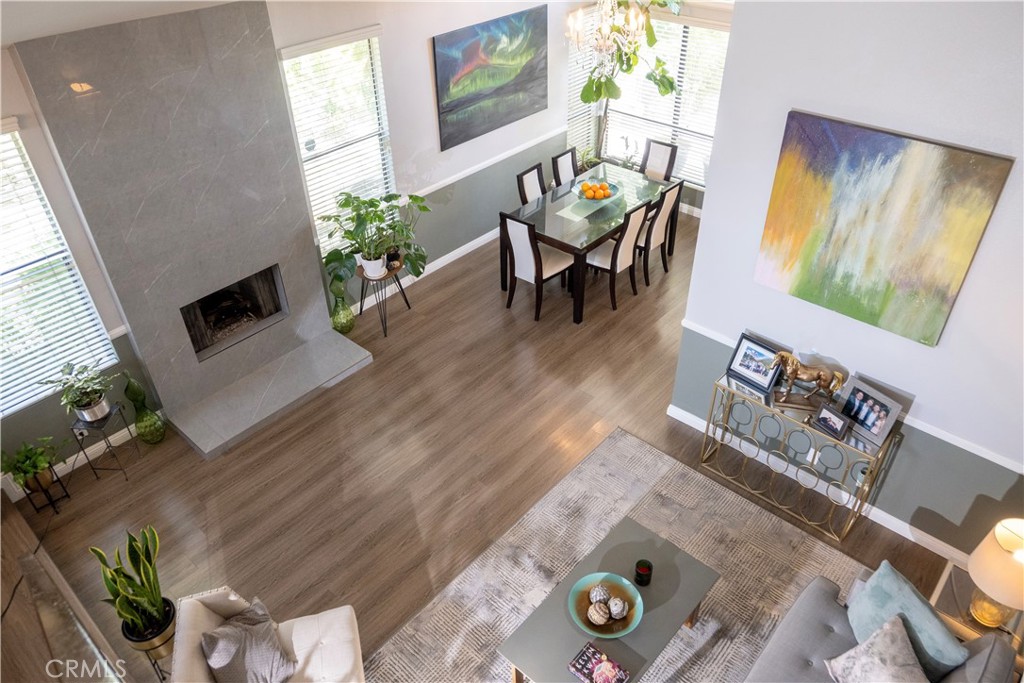 1320 Zeus West Covina, CA 91790 - Photo 9 of 39 a living room with furniture and a fireplace