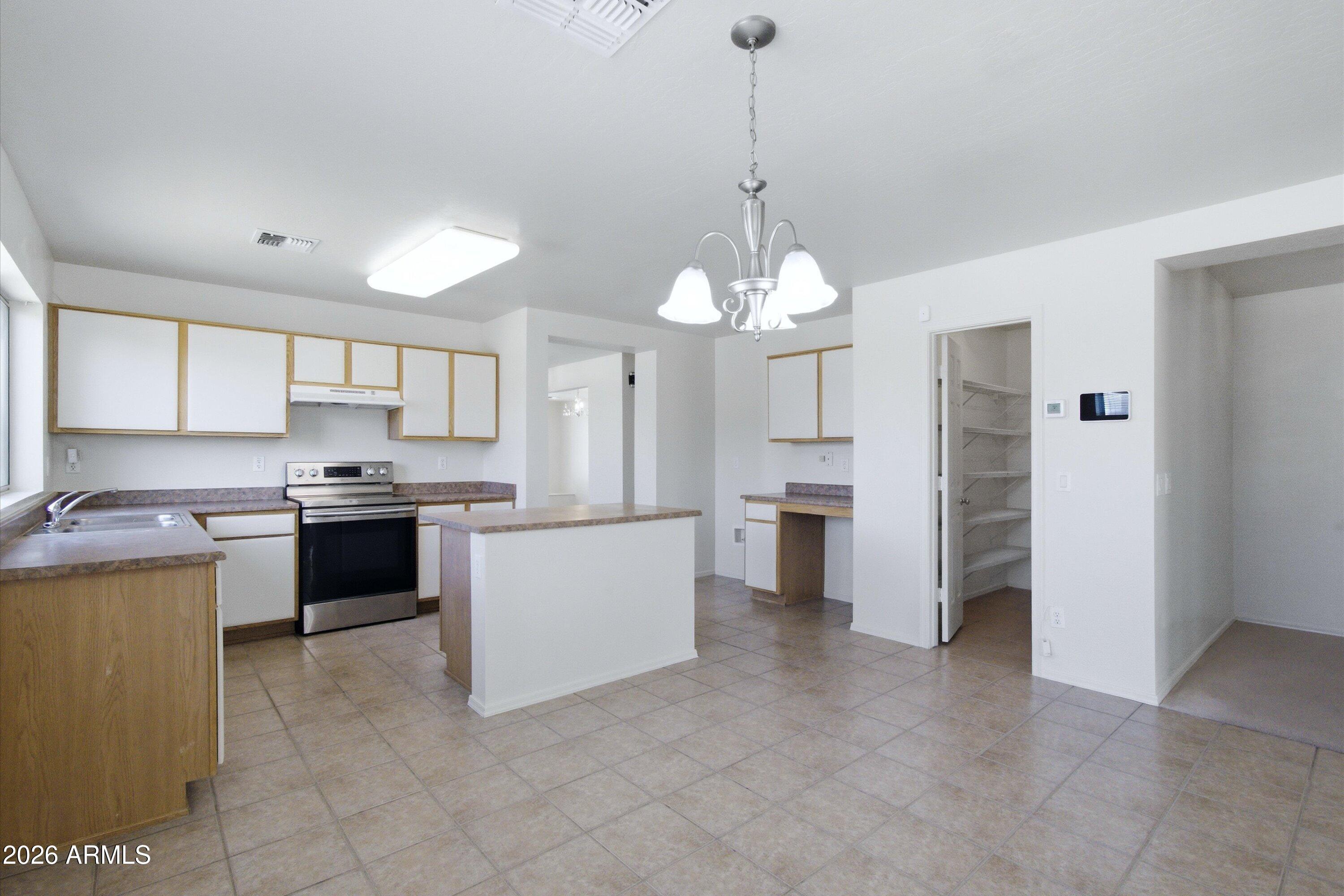2933 West Maldonado Road Phoenix, AZ 85041 - Photo 10 of 27 Kitchen 2