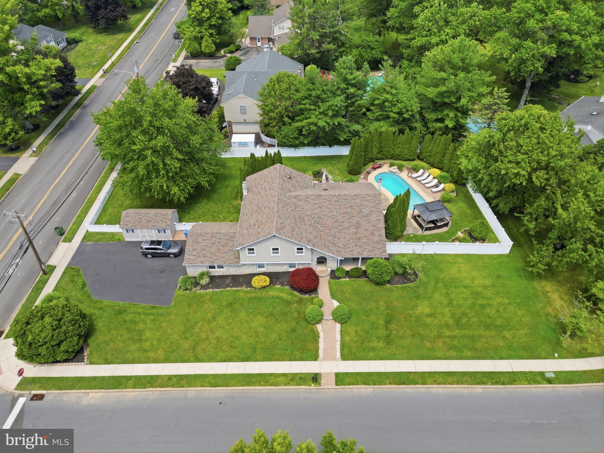 1002 Tannerie Run Road Ambler, PA 19002 - Photo 58 of 67 Spacious home with lush greenery and pool.