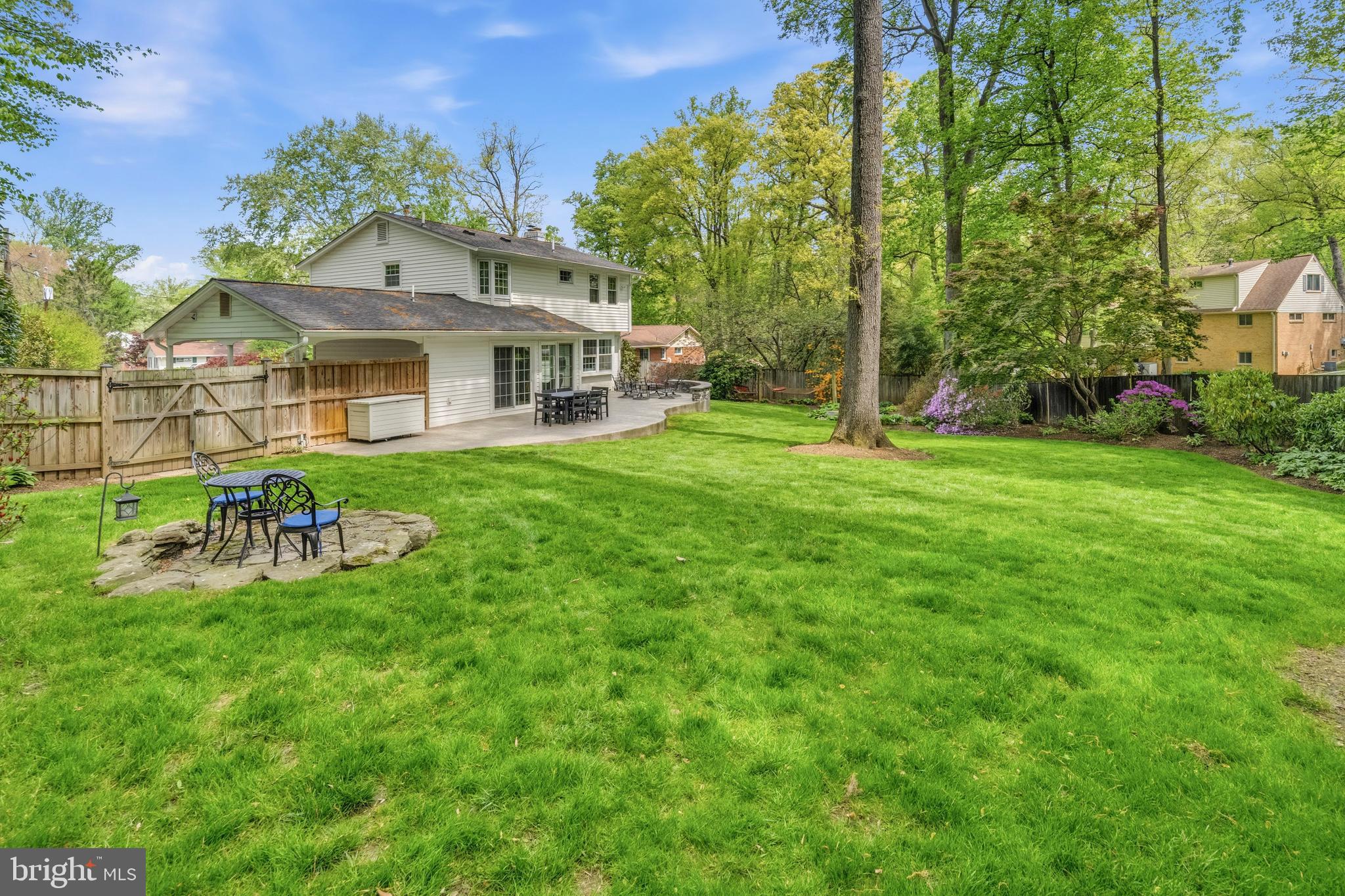 8927 Cromwell Drive Springfield, VA 22151 - Photo 15 of 20 a view of a house with a yard porch and sitting area