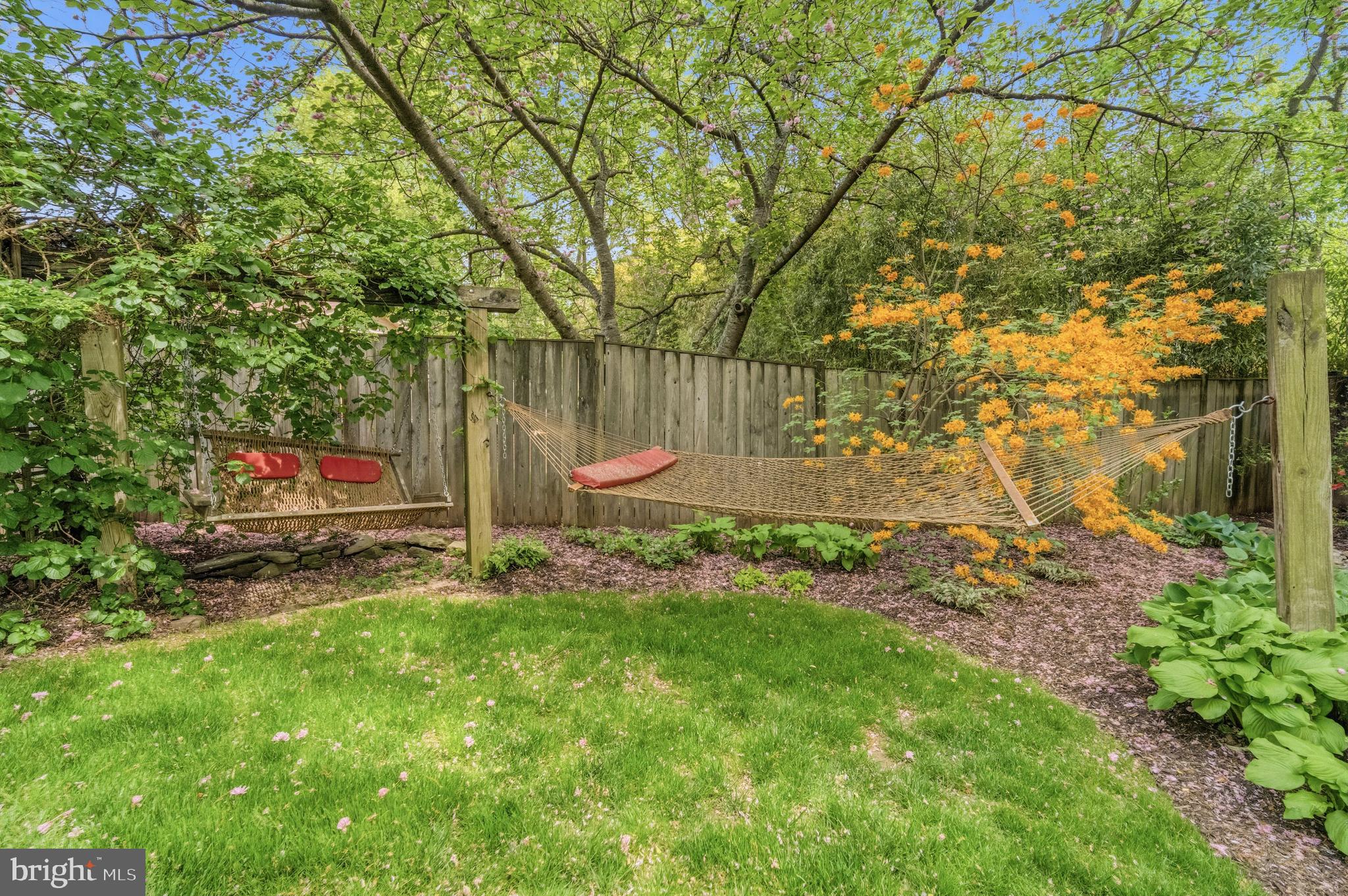 8927 Cromwell Drive Springfield, VA 22151 - Photo 17 of 20 a backyard of the house with lots of green space