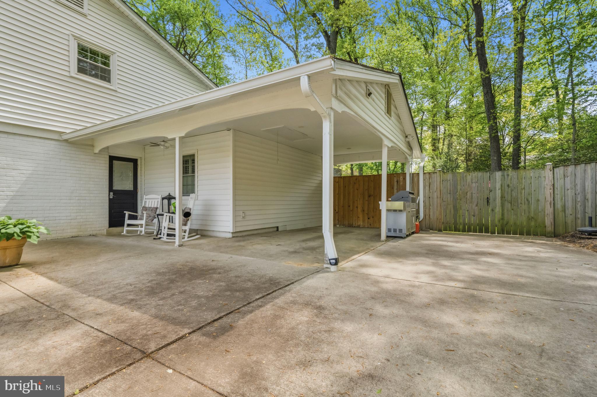 8927 Cromwell Drive Springfield, VA 22151 - Photo 20 of 20 a view of a house with backyard and trees