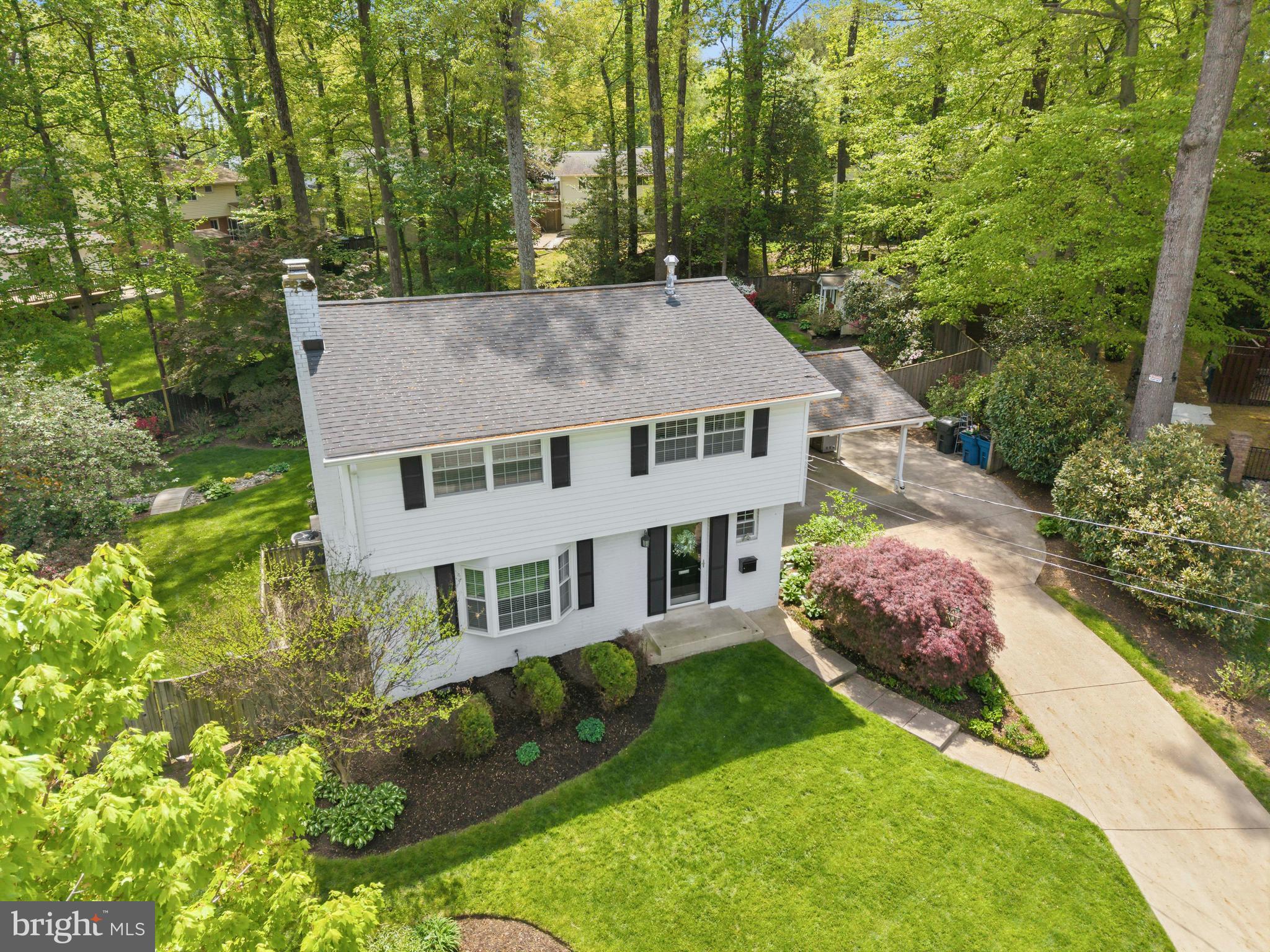 8927 Cromwell Drive Springfield, VA 22151 - Photo 2 of 20 front view of a house with a yard