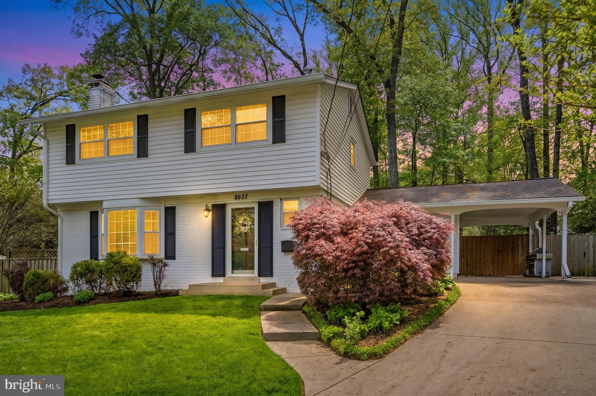 8927 Cromwell Drive Springfield, VA 22151 - Photo 4 of 20 a front view of a house with garden