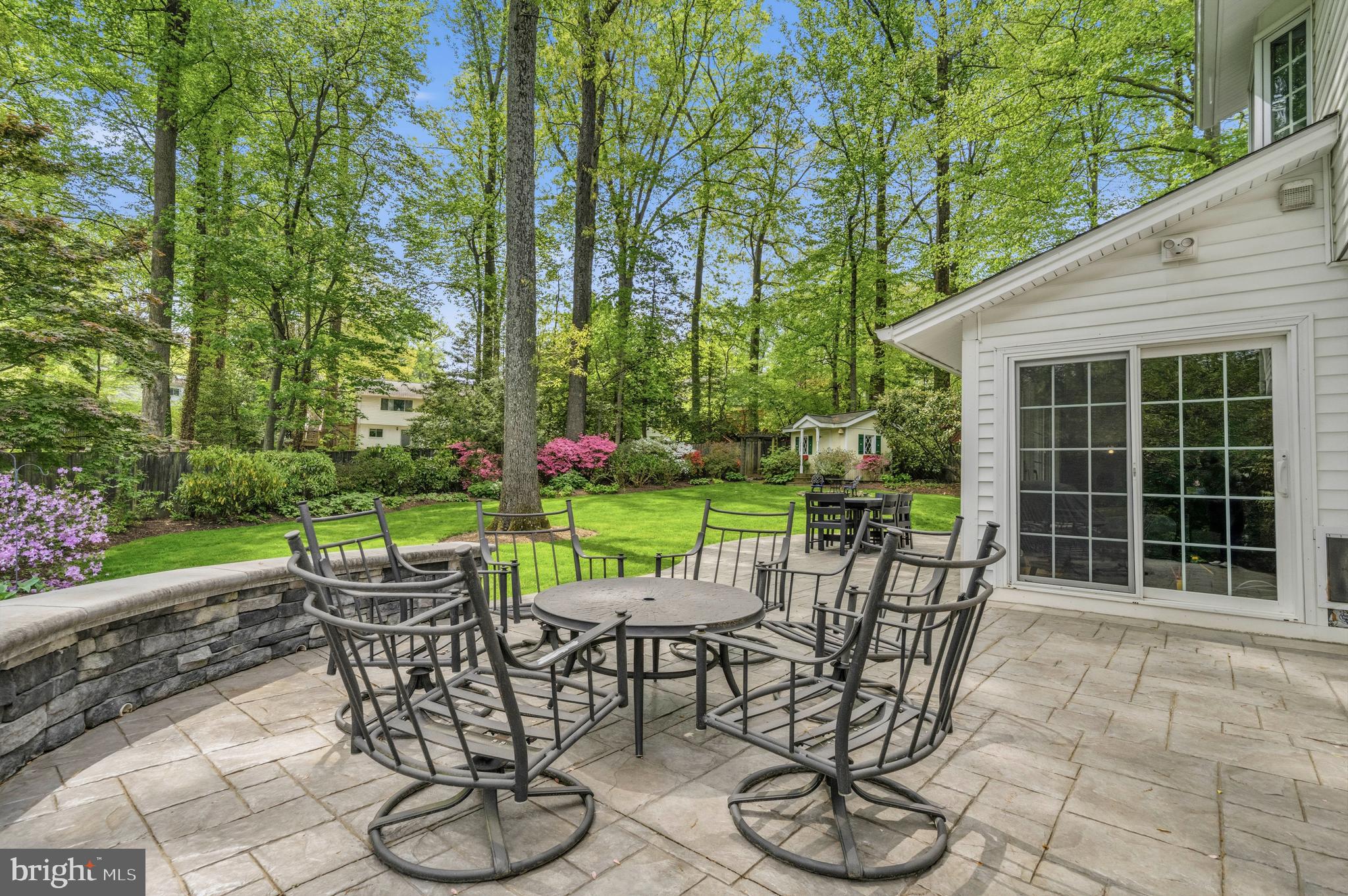 8927 Cromwell Drive Springfield, VA 22151 - Photo 10 of 20 a table and chairs in a garden