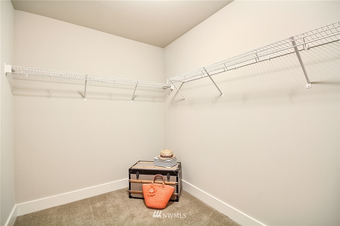 5113 Northeast 11th Place Renton, WA 98059 - Photo 27 of 40 a view of a room with racks on the wall