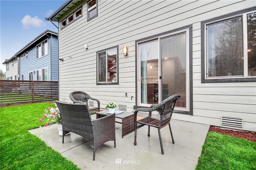 5113 Northeast 11th Place Renton, WA 98059 - Photo 39 of 40 a view of a house with backyard and sitting area